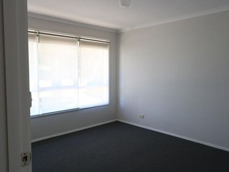 Neat & Modern 3-Bedroom Home with Low Maintenance Yard - Photo 3