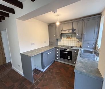 A 2 bedroom terraced cottage with a double garage and off-street pa... - Photo 3
