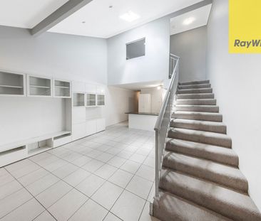 UNIQUE TWO-STOREY LIVING AT ITS BEST - Photo 2