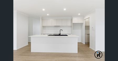 Stunning Family Home with Modern Comforts & Premium Features - Photo 4