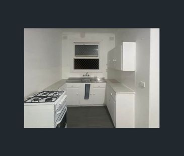 Neat 2 Bedroom Home with Spacious Backyard - Photo 1
