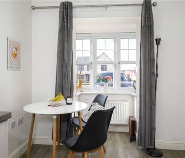 A well-presented two bedroom mid-terrace on the popular modern deve... - Photo 4