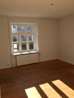 Indbydende 2-værelses lejlighed med central beliggenhed - Photo 1