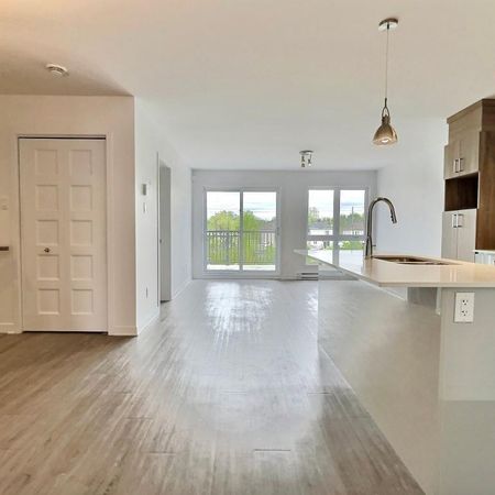 Condo 4 ½ Gare Ste-Rose Laval – 2 chambres, 2 salles de bain – 1 302 pi² – Garage inclus - Photo 4