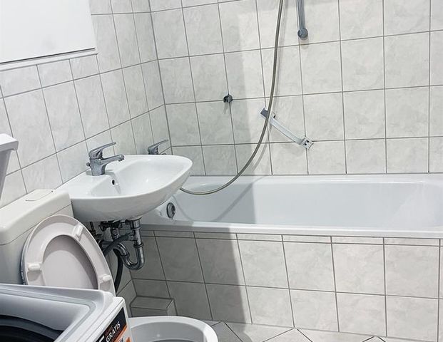 Helle 1-Raum-Wohnung mit moderner Einbauküche - Foto 1