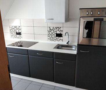 Attraktive Dachgeschosswohnung in ruhiger Lage - Photo 2