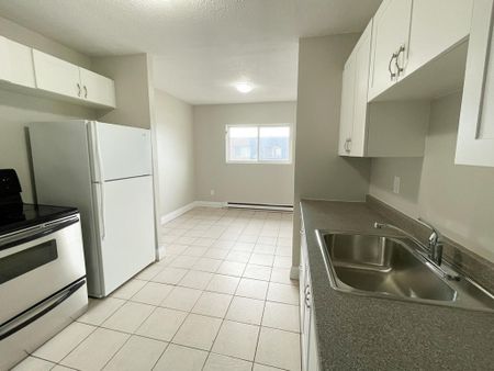 Boxwood Place Apts - PARKING SPACE & WATER INCLUDED - Photo 2