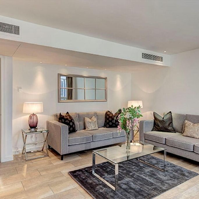 This 2-bedroom apartment has been individually designed to the highest specification allowing for space, light and style. - Photo 1