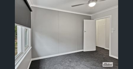 A beautifully renovated four-bedroom home - Photo 4