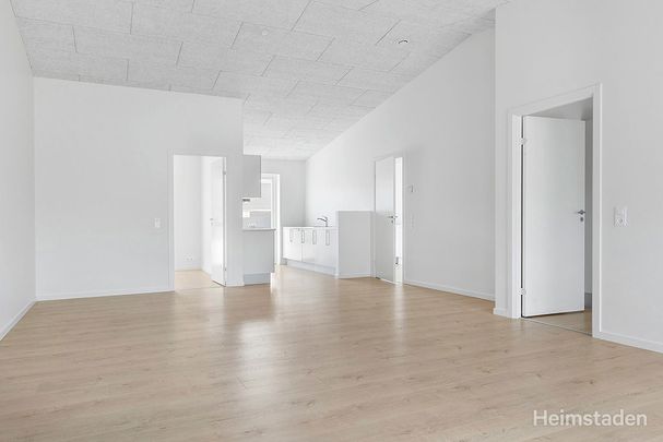 Rækkehus i nyere kvarter med legeplads og grønneområder, med plads til fælleskab. - Foto 1