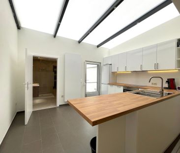Gerenoveerde rijwoning met drie slaapkamers - Photo 6