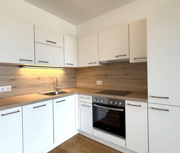Günstige 2-Zimmer-Neubauwohnung mit großer LOGGIA (5,54m²) nahe Aka... - Foto 3