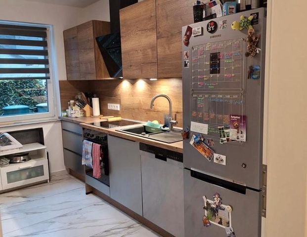 Hochwertige Sanierte Erdgeschosswohnung mit Garten und Garage - Foto 1