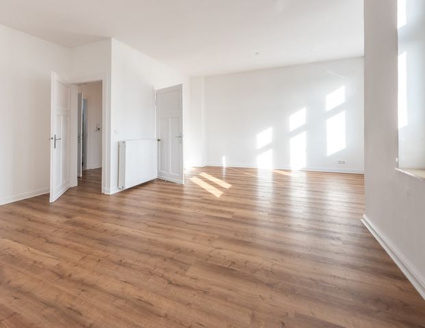 Stilvolle Maiso­nette mit Altbau-Charme! - Foto 1