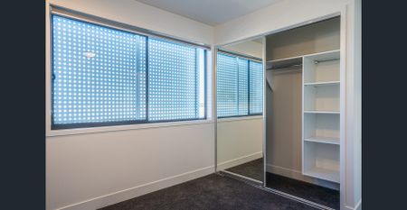 Modern Three-Bedroom Townhouse in a Peaceful, Well-Maintained Complex - Photo 3