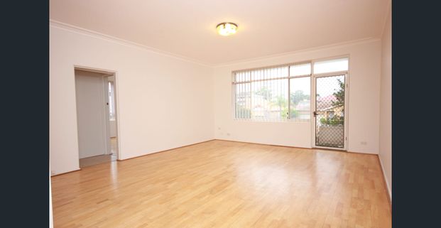 LOCATED ON FIRST FLOOR! - Photo 1