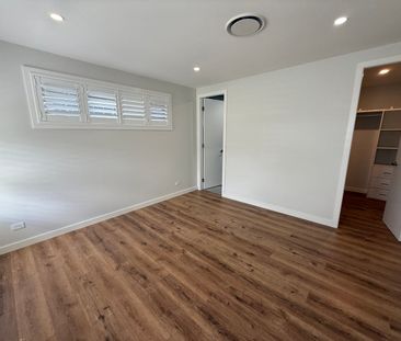 Modern 4-Bedroom Home! - Photo 1