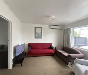 Modern, tidy and sunny unit in a great location. - Photo 2