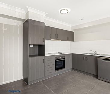 Two bedroom unit in Highly Sort After location - Photo 2