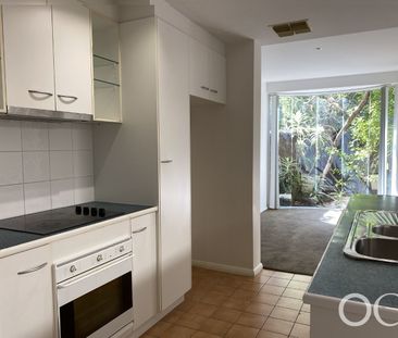 Open the Door To Parkside Living in a Spacious Kensington Townhome - Photo 3