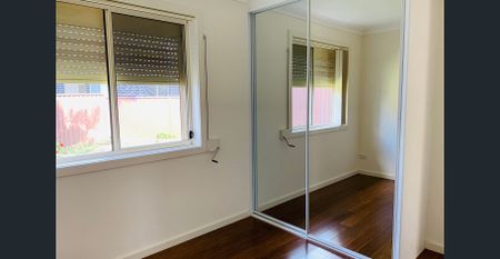 Spacious 2-Bedroom Home with Large Private Yard - Photo 2