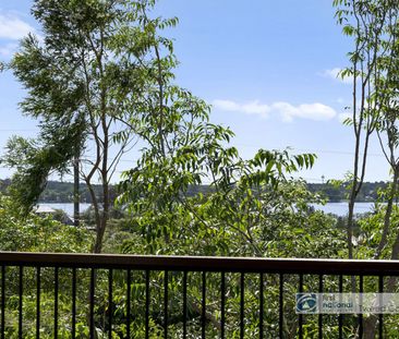 Renovated Coastal Haven with River Views on 1,244sqm Corner Block - Photo 6