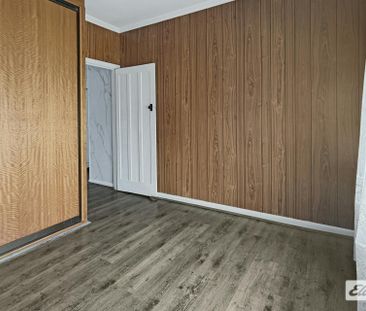 THREE-BEDROOM HOME WITH GARAGE - Photo 5