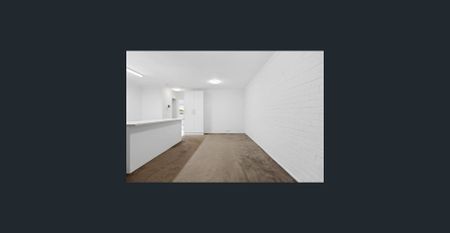 Light-Filled and Low-Maintenance Two-Bedroom Unit - Photo 5