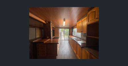 Spacious Dual Living Highset Home with Pool and Secure Gated Entry - Photo 4