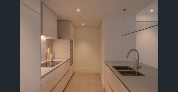 Modern dockside two-bedroom sanctuary offering refined comfort and world class urban amenities, with parking - $1,550/week fully furnished - Photo 1