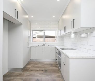 New Interior - Fully Tiled & Airconditioned - Large Fenced Backyard - Photo 1