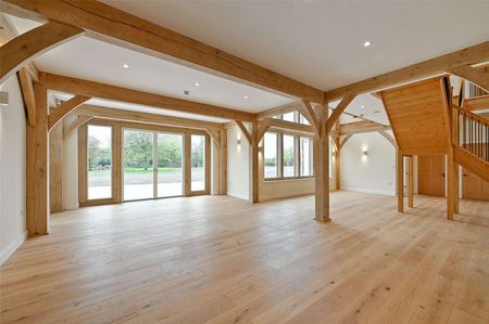 A grand oak-framed country home with vaulted ceilings and striking architectural detail - Photo 2