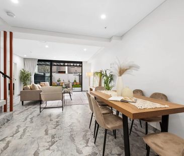 Brand-New Four-Bedroom Townhouse in Prime Location - Photo 1
