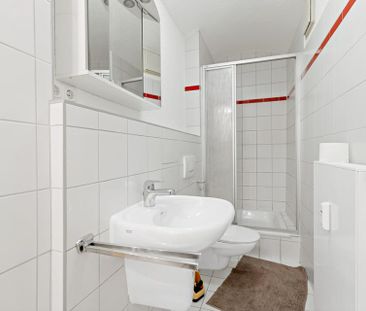 Charmante 2-Raumwohnung mit Einbauküche am Kirchtor! - Photo 1