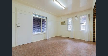 Freshly Painted 3-Bedroom Home on a Large Block - Photo 3