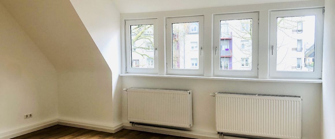 Sanierte Dachgeschosswohnung direkt in der Innenstadt - Photo 1