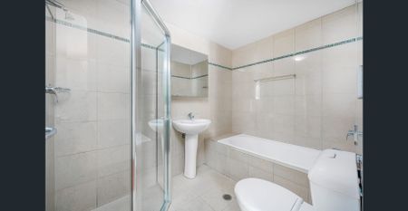 SPACIOUS ONE BEDROOM APARTMENT - LAMINATE TIMBER FLOORING THROUGHOUT - Photo 2