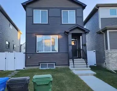 Spacious 3-Bedroom home with Double Garage, Air Conditioning & Fenced | 84 Seton VI Southeast, Calgary - Photo 1