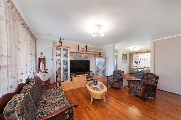 Elevated Family Living with Modern Comforts in a Prime Location - Photo 1