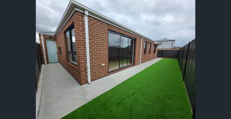 Corner-Block Comfort with Serene Creek Views - Photo 5