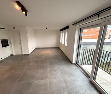 Prachtig nieuwbouwappartement met 2 slprs, terras en autostaanplaats! - Photo 1