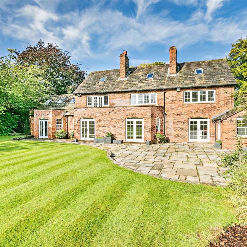 Superb contemporary gated home with gym, sauna, and fabulous south facing gardens, well located on the outskirts of Wilmslow and Alderley edge. - Photo 1