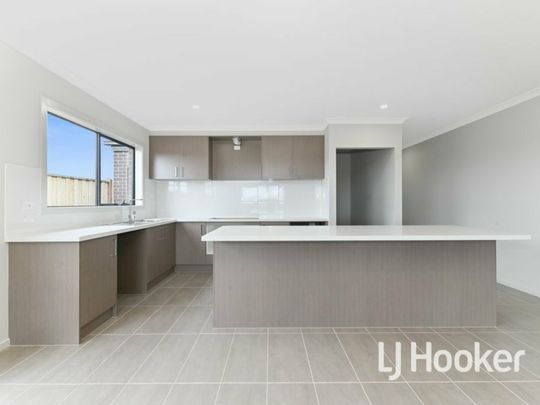 Brand New Four Bedroom Home! - Photo 1