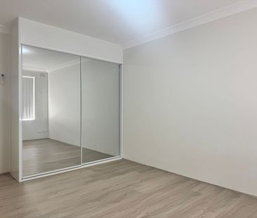RENOVATED 3 BEDROOM TOWNHOUSE - Photo 1