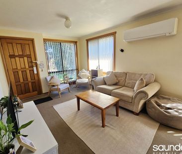 Unit with brand new bathroom - Photo 1