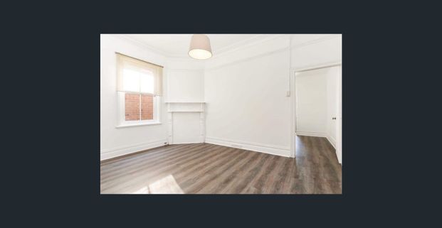 Spacious 2 Bedroom Home with Large Backyard - Photo 1