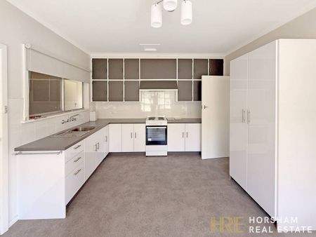 Modern Three-Bedroom Home Close to the CBD - Photo 3