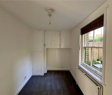 An updated two bedroom semi-detached cottage located in the village... - Photo 3