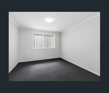 Spacious Family Living Awaits in This Stunning 4-Bedroom Home - Photo 2