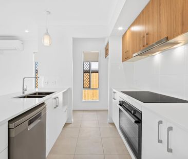 Experience Modern Living in a Brand-New Four-Bedroom Home! - Photo 6